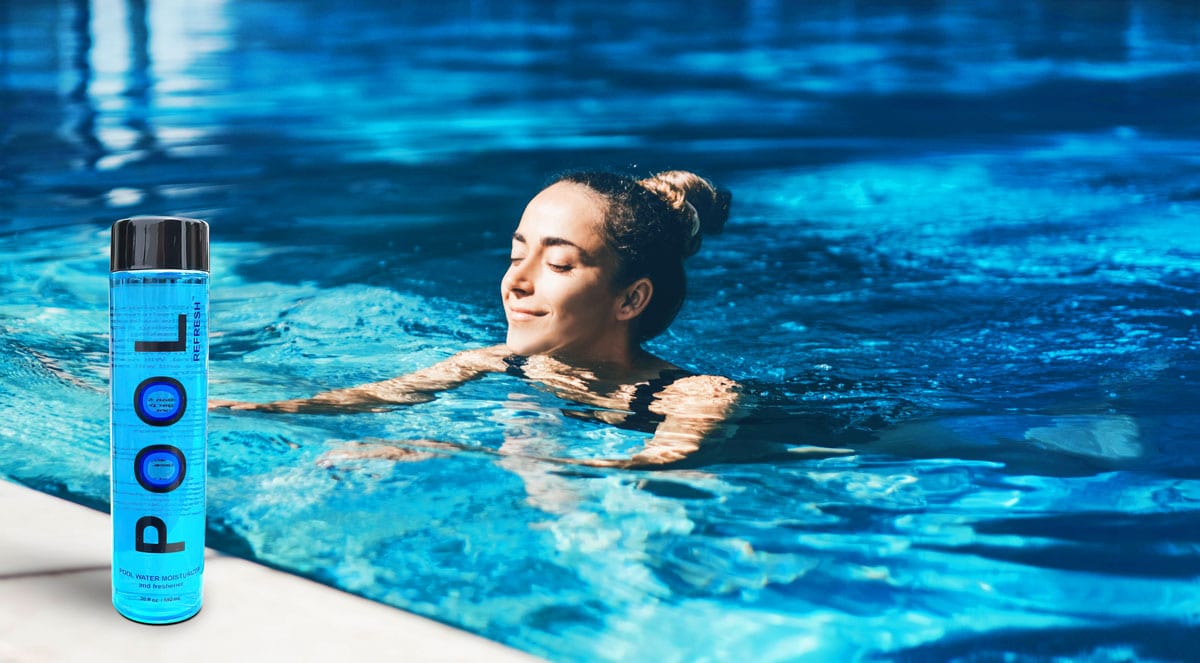 Woman swimming in a pool and on the edge of the pool in a bottle of inSPAration Pool Refresh